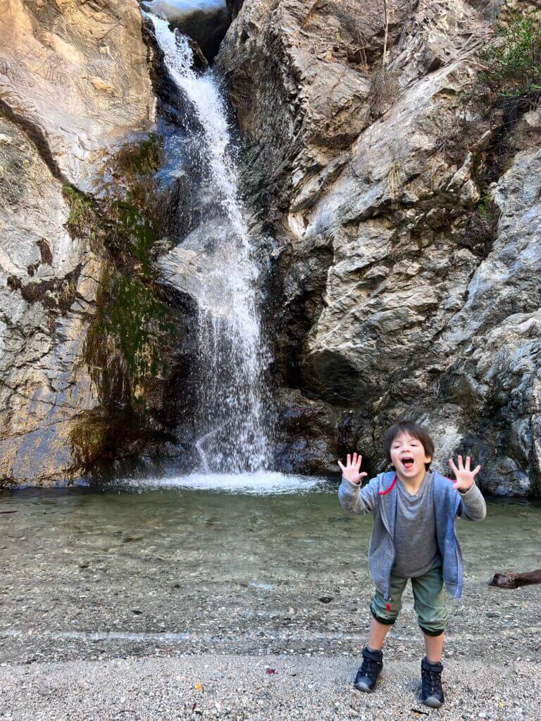 Boy with waterfall